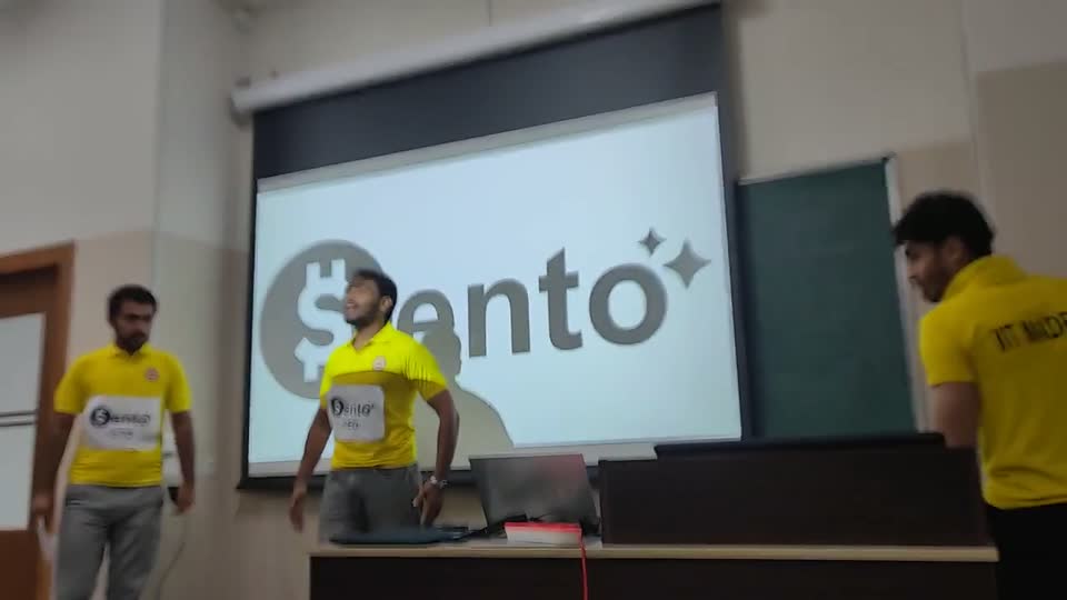 Fuzlan presenting the Sento pitch on stage at IIT Madras.